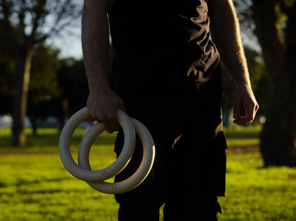 Athlete holding workout rings