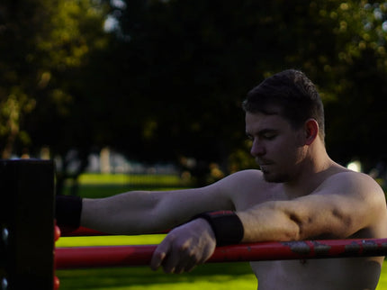 Athlete wearing wrist wrap in a calisthenics park