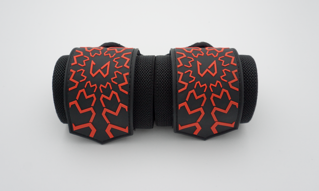 Black and red patterned wristbands on a white background for calisthenics and crossfit