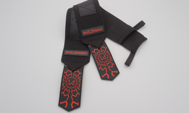 Black and red patterned wrist wraps for wrist protection on a light gray background
