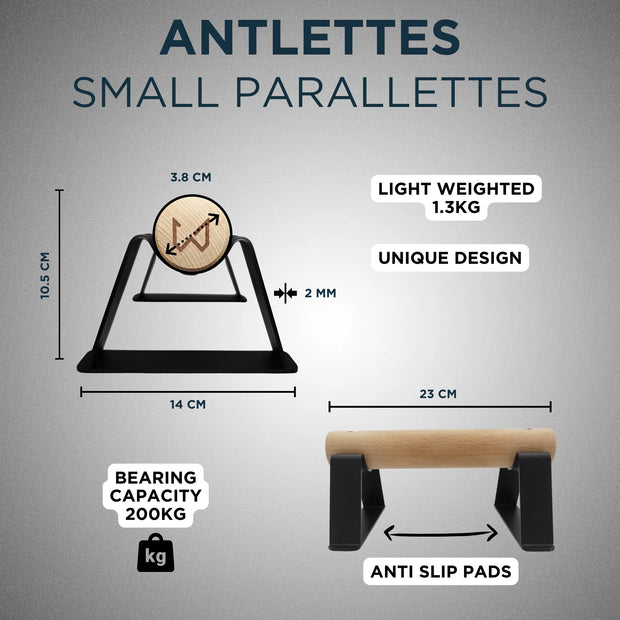Small parallettes with dimensions and features on a gray background
