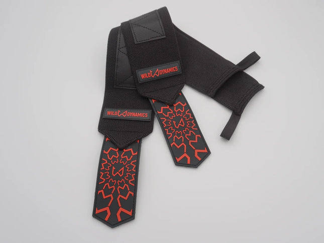 Black and red wrist wraps with 'Wild Dimension' branding on a light gray background