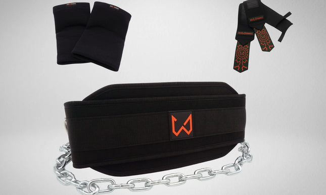 Black dip belt with chain, wrist wraps and elbow sleeves on a light gray background