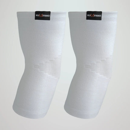 Pair of white elbow sleeves with visible branding on a light gray background